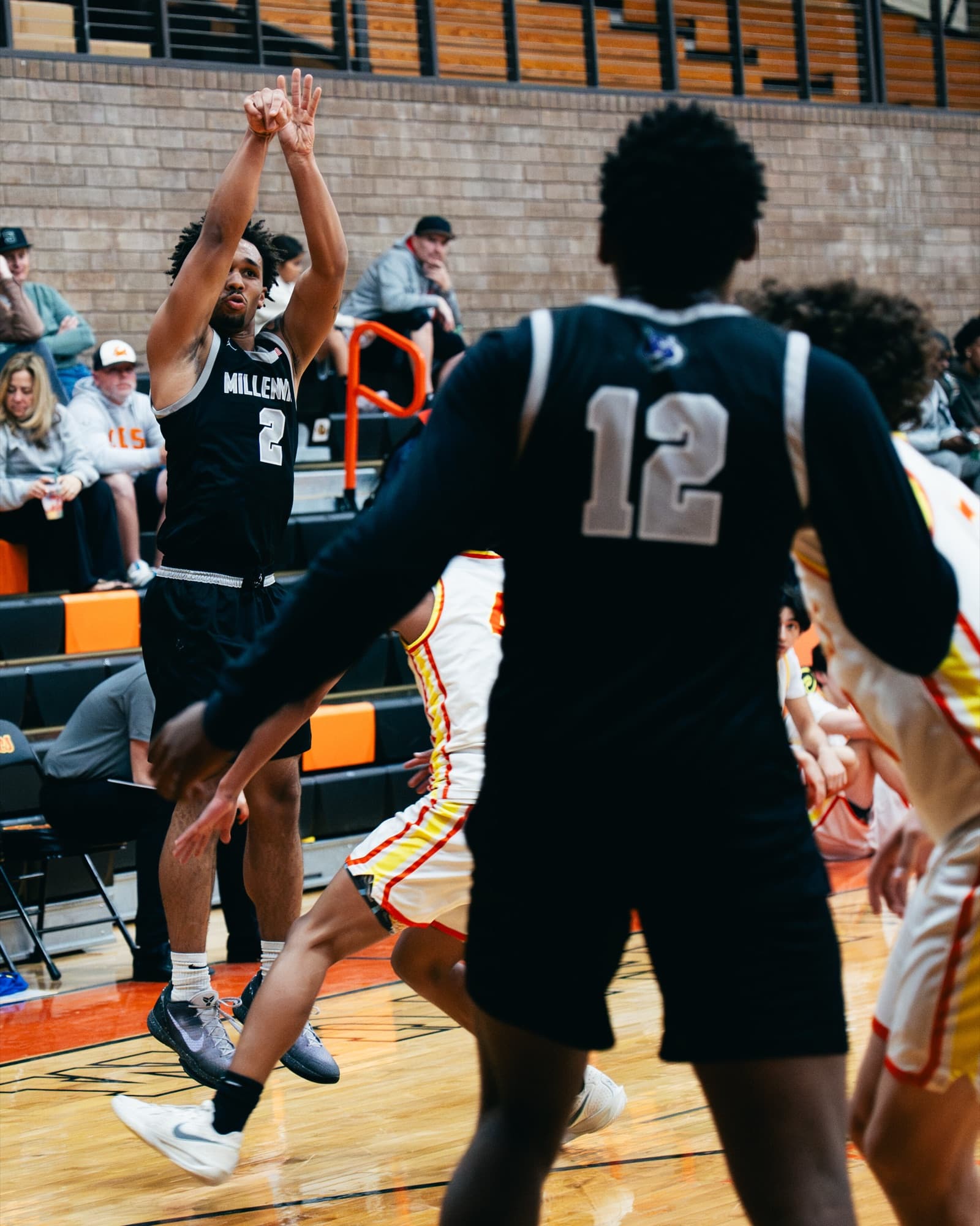 Basketball player driving to the hoop